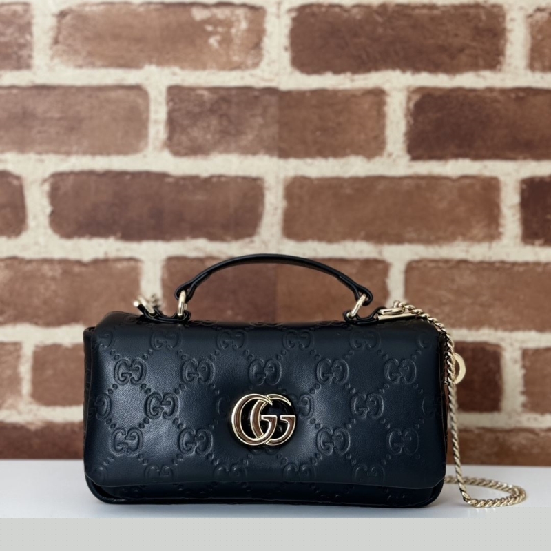 G*u*i top handle bags